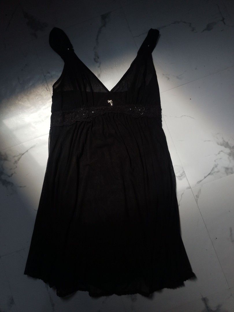 Black Dress with Embellishments (Category: Dresses) located in Manila. Submitted by riahnne (Listing ID 1438360887, Image 2). Description: MOD ❗JNT DIRECT❗ MOP ❗GCASH❗ ❗PAYMENT FIRST❗ PM FOR MORE INFO - Black midi dress - V-neck design - Delicate waist embellishments - Lightweight, flowing fabric - Thin straps - Flattering silhouette - Ideal for warm weather or special occasions.