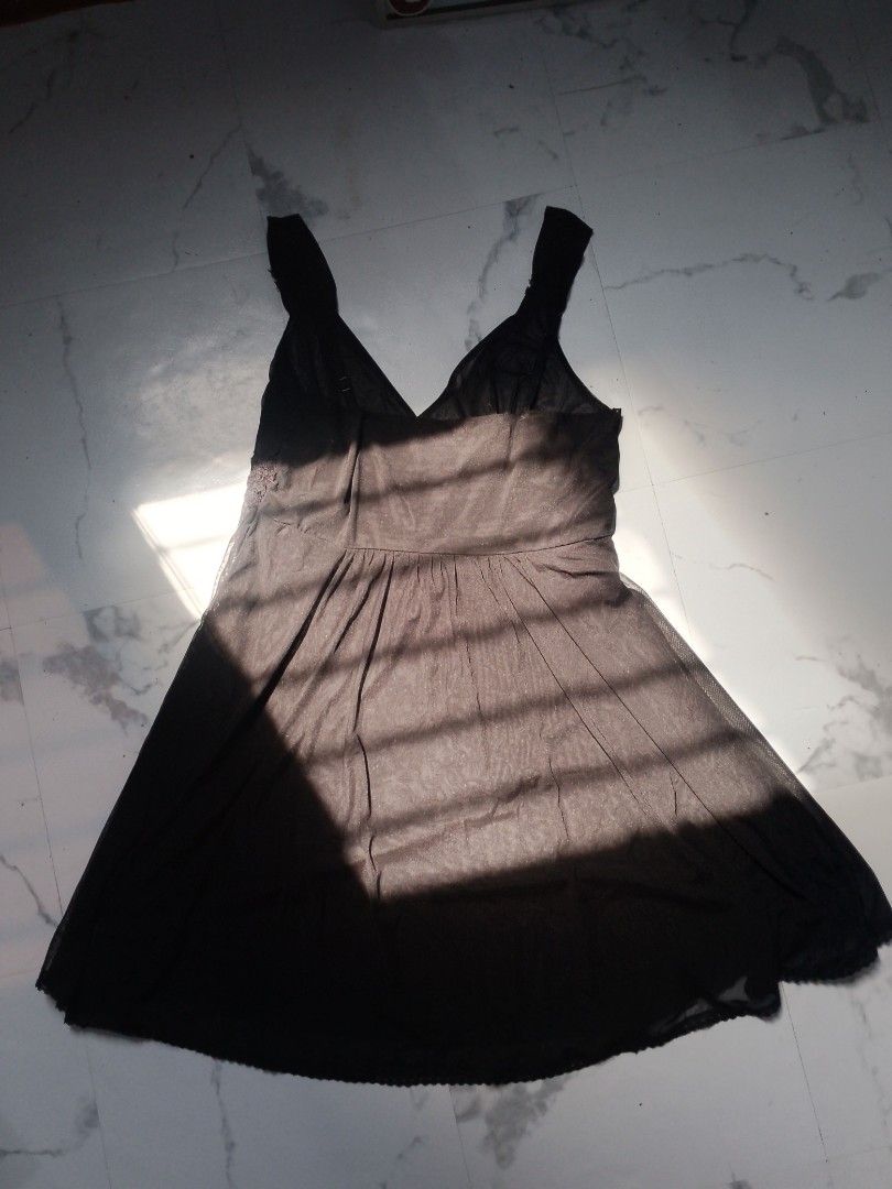 Black Dress with Embellishments (Category: Dresses) located in Manila. Submitted by riahnne (Listing ID 1438360887, Image 3). Description: MOD ❗JNT DIRECT❗ MOP ❗GCASH❗ ❗PAYMENT FIRST❗ PM FOR MORE INFO - Black midi dress - V-neck design - Delicate waist embellishments - Lightweight, flowing fabric - Thin straps - Flattering silhouette - Ideal for warm weather or special occasions.