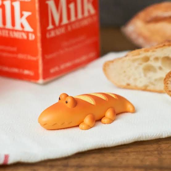 Animal Bakery Blind Box Bread Alligator Figurine (Category: Designer & Blind Box Toys) located in Muntinlupa City. Submitted by beacq (Listing ID 1438318771, Image 1). Description: - Adorable alligator figurine. - Made to look like bread. - Bright orange color. - Detailed with eyes and legs. - Great for collections or as a desk accessory. - Small size, fits on shelves or tables..