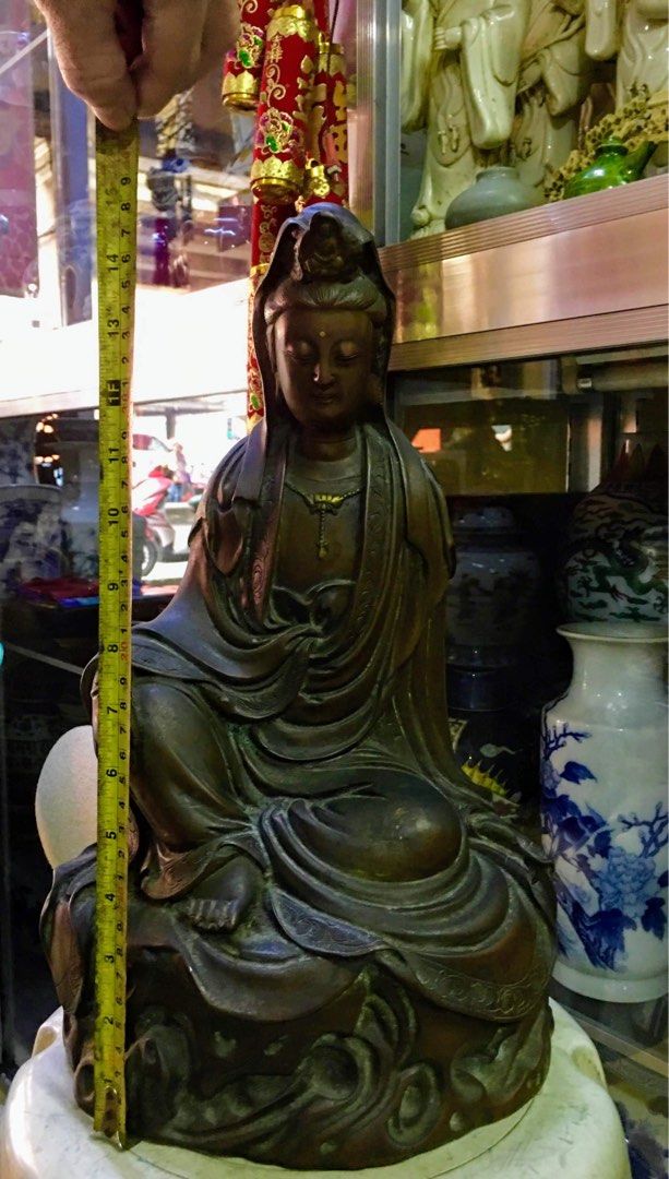 Bronze Guan Yin Statue (Category: Religious Items) located in Cavite. Submitted by esp777 (Listing ID 1438450218, Image 2). Description: - Bronze Guan Yin statue - Approximately 13 inches tall - Features intricate details - Dark brown patina - Depicts Bodhisattva in meditative pose - Beautiful decor piece - No to SWAP Price: 150,000.