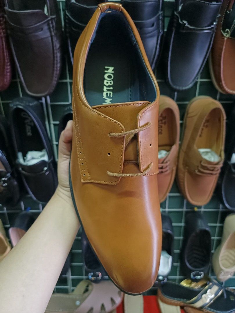 Brown Leather Shoes for Men with flaw (Category: Dress Shoes) located in Bacoor. Submitted by cheriejolieph (Listing ID 1438364544, Image 2). Description: - with minor flaw - Brown leather dress shoes - Lace-up style - Textured sole for grip - Classic, formal design - Suitable for various occasions.