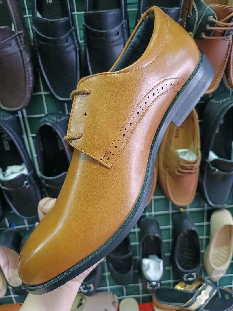 Brown Leather Shoes for Men with flaw (Category: Dress Shoes) located in Bacoor. Submitted by cheriejolieph (Listing ID 1438364544, Image 3). Description: - with minor flaw - Brown leather dress shoes - Lace-up style - Textured sole for grip - Classic, formal design - Suitable for various occasions.