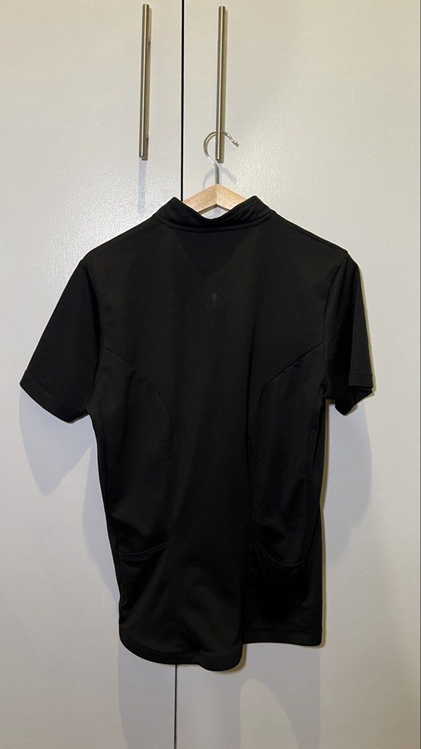 BTwin Decathlon Cycling Jersey S - halfzip (Category: Activewear) located in Pasig City. Submitted by bulittt (Listing ID 1438468548, Image 2). Description: - Size: small - Color: Black - Features: Black short sleeves, back pockets, halfzip collar - Minor honest issue in last photo.