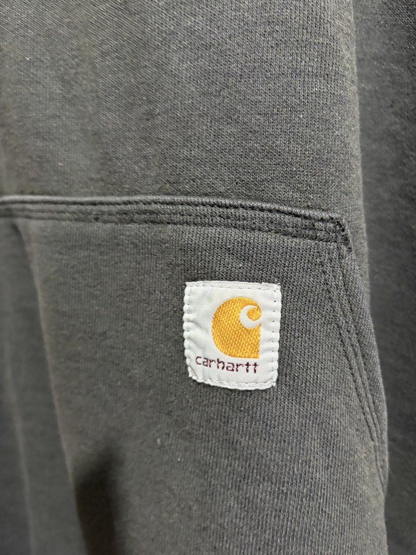 Carhartt Hoodie - Small (Category: Hoodies) located in Angeles City. Submitted by declutter.pamp (Listing ID 1438407860, Image 2). Description: - Carhartt hoodie - Color: Dark Grey - Size: Small - Features: Kangaroo pocket, Carhartt logo on front and sleeve - Made in Honduras.
