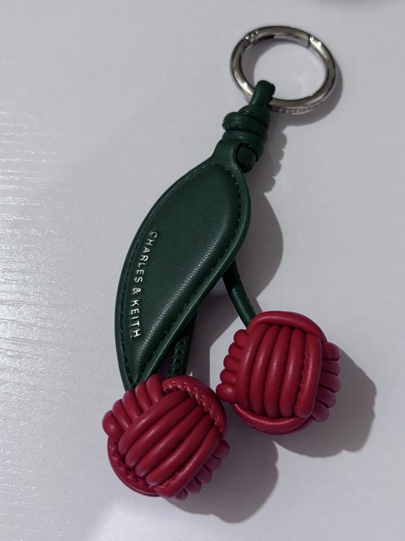 Charles & Keith cherry charm (Category: Other Accessories) located in Paranaque City. Submitted by luxemomma (Listing ID 1438356813, Image 1). Description: Like new. Authentic Loc: Paranaque MOP: Gcash.
