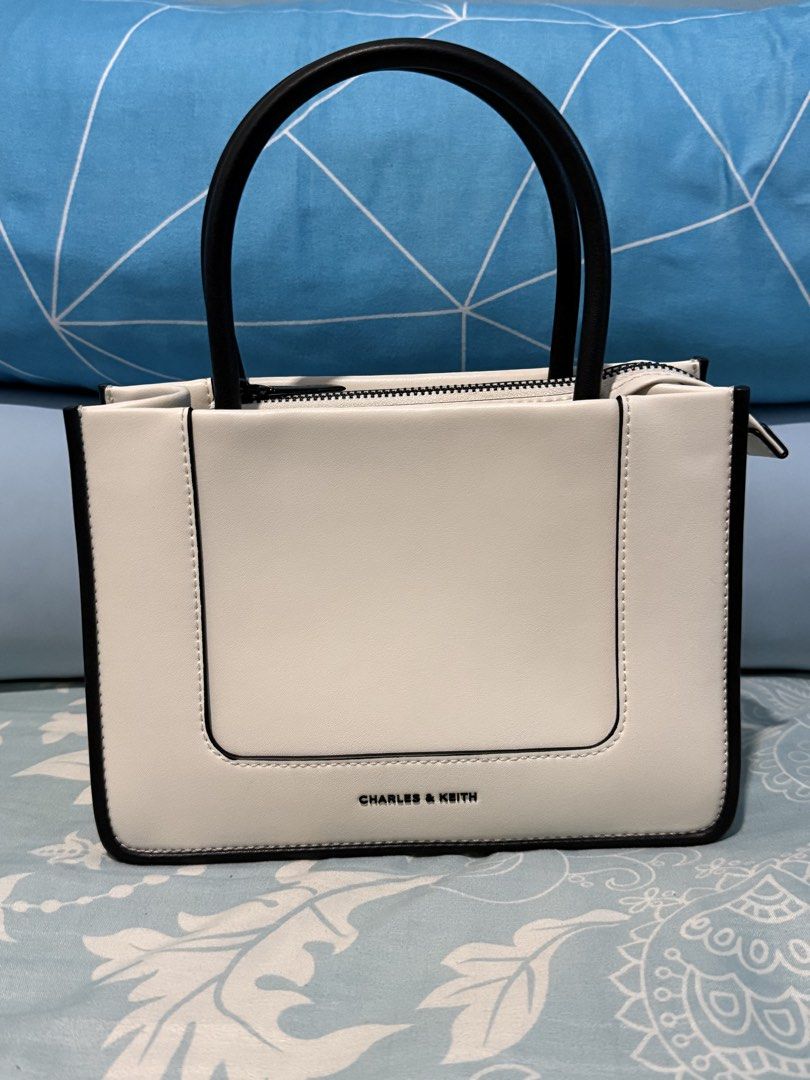 Charles & Keith Mini Dallya Tote Bag (Cream) (Category: Cross-body Bags) located in Pasig City. Submitted by clau.ph (Listing ID 1438368611, Image 1). Description: 3,999php SRP With dust bag.