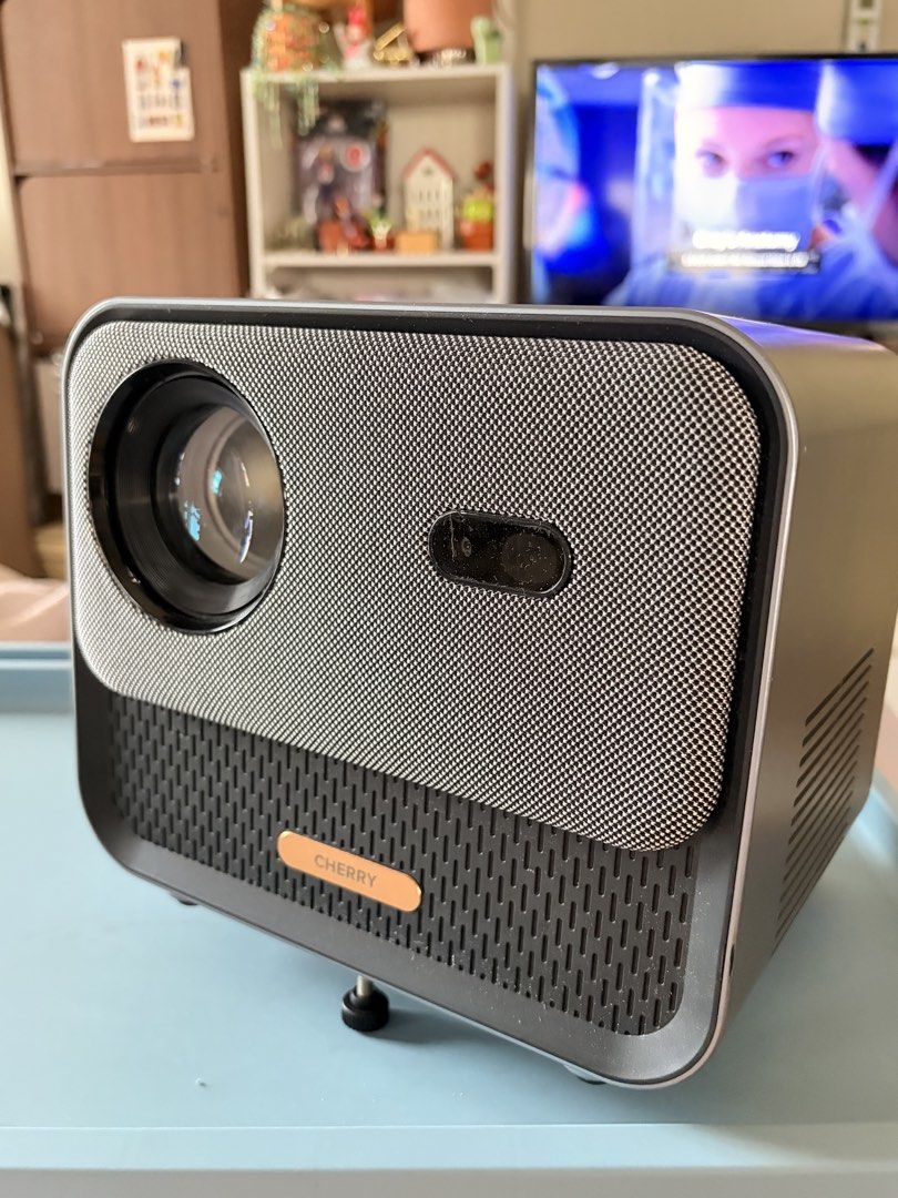 CHERRY Superion View Pro Projector (Category: Projectors) located in Manila. Submitted by abysingss (Listing ID 1438385943, Image 1). Description: CHERRY Superion View Pro Smart Projector Retails for 12,900 online - Lightly used - Cosmetics 8/10 - Still in good working condition but has issue connecting to Netflix (must be a system or update related issue) - YouTube and HDMI still working perfectly - Audio & projection working well too - comes wi