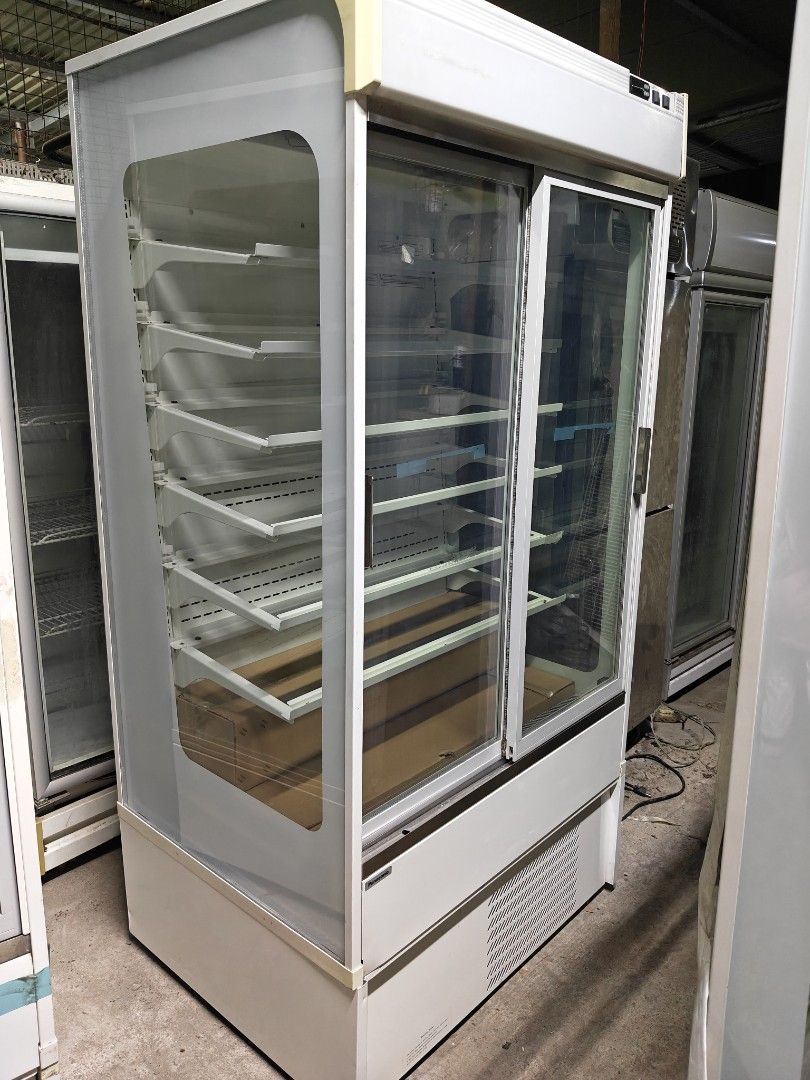 Commercial Display Refrigerator with Sliding Doors (Category: Refrigerators and Freezers) located in Paranaque City. Submitted by cooltree_7b705d (Listing ID 1438488114, Image 3). Description: - Commercial display refrigerator - Sliding glass doors - White exterior - Multiple shelves for organized display - Interior lighting - Temperature control panel - Bottom ventilation - Ideal for retail and food service.