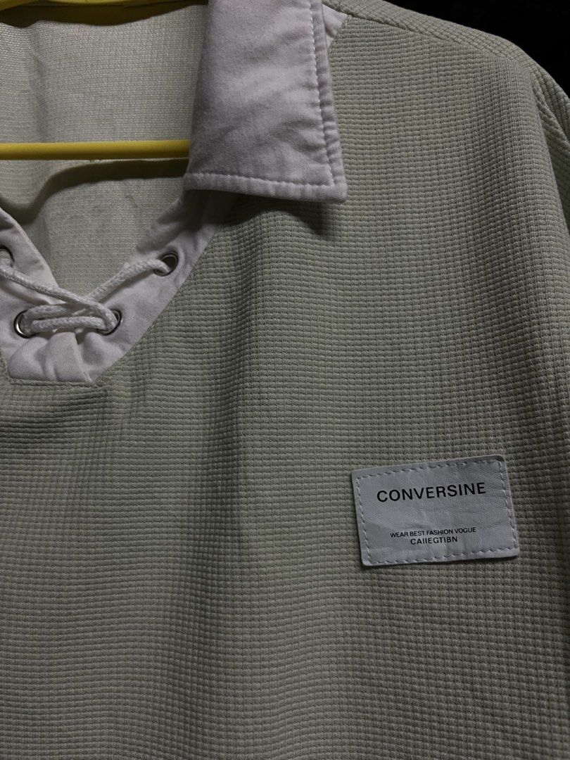 Conversine Waffle Knit Polo Shirt (Category: Tshirts & Polo Shirts ) located in Taguig. Submitted by misguidedghost (Listing ID 1438425283, Image 2). Description: Light Green Stringed Polo Shirt Brand: No Brand Size: M - Conversine polo shirt - Unique waffle knit texture - Light green color - White collar and sleeve cuffs - Lace-up neckline detail - Small Conversine label - Short sleeves - Relaxed fit.
