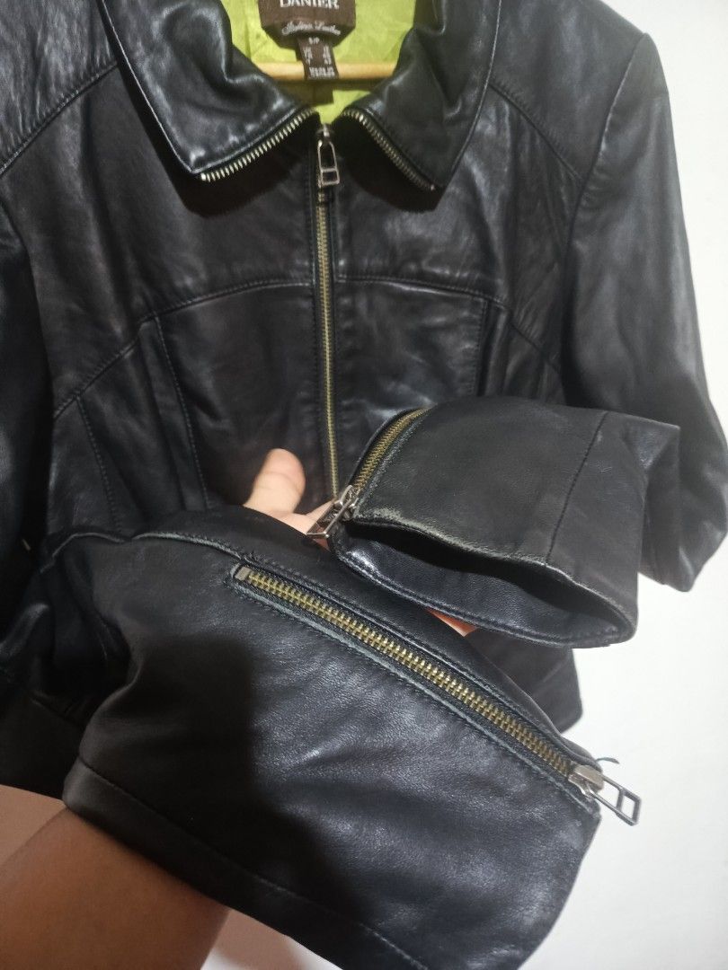 DANIER ITALIAN LEATHER JACKET (Category: Coats, Jackets and Outerwear) located in Baguio. Submitted by 074thriftmania (Listing ID 1438424179, Image 3). Description: - Danier black leather jacket - Women's size S/P - Zip-up front - Zippered sleeves - Collared neckline - Green interior lining - Interior pocket - Classic design length 22.5" width 19" sleeves 25" shoulder 16".