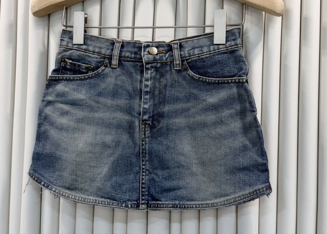 Denim Mini Skirt (Category: Skirts) located in Surigao. Submitted by danielleeee9 (Listing ID 1438350937, Image 1). Description: - Classic denim mini skirt -Waist: 25-26 -L: 12 -No issues - Button closure - Front pockets - Raw hem - Faded wash for a vintage look - Versatile and easy to pair - Perfect for casual wear.