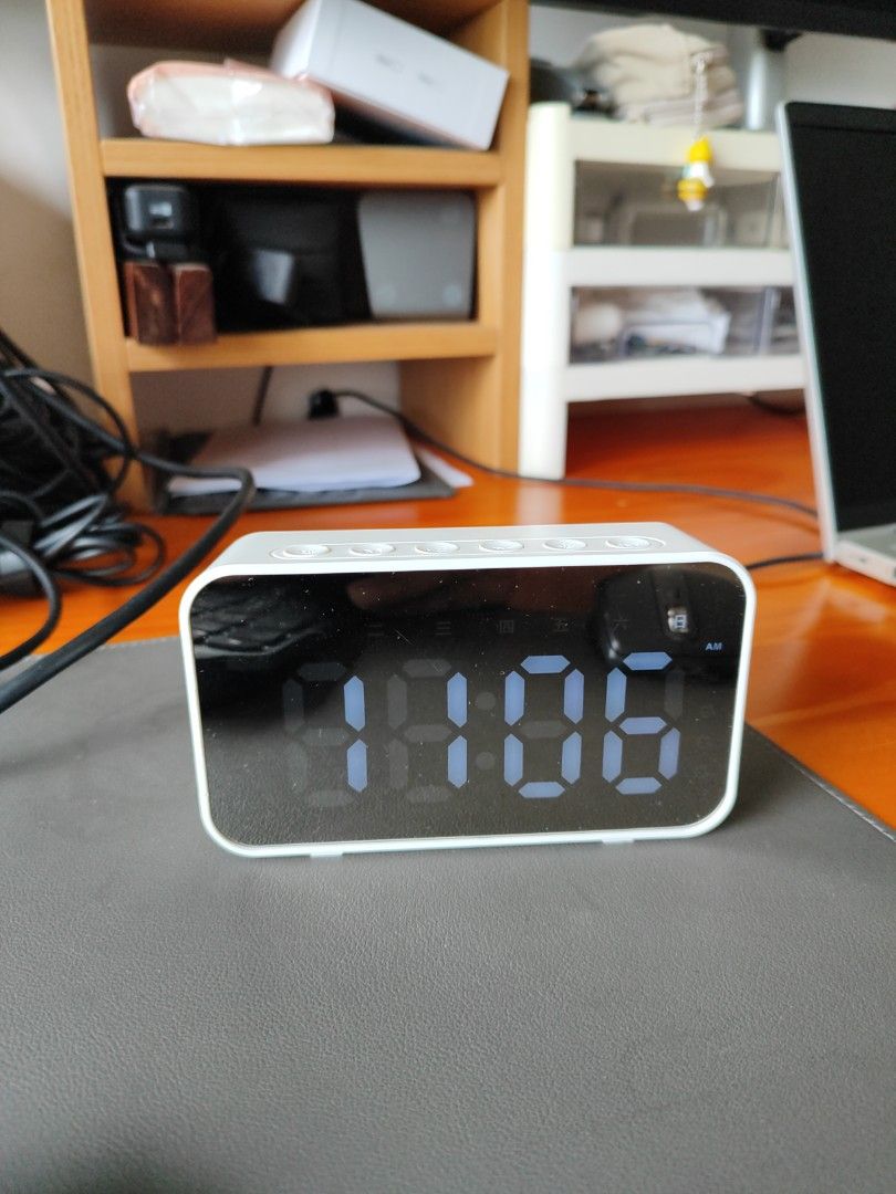 Digital clock (Category: Clocks) located in Singapore. Submitted by tidyfun (Listing ID 1438324481, Image 1). Description: - Digital clock - Modern and clean design - Clear and easy-to-read display - Suitable for desk or bedside table - Simple and stylish.
