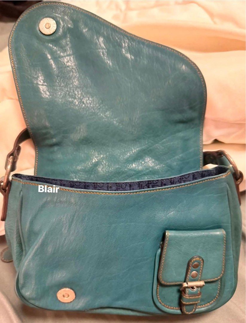 Dior saddle bag vintage (Category: Luxury Bags & Wallets) located in Paranaque City. Submitted by blairclo (Listing ID 1433325250, Image 3). Description: Vintage Christian Dior Gau|cho Saddle Bag (2006 Galliano era) – Authentic (LegitGrails certified) – Rare crossbody style (hard to find vs usual shoulder versions) – Beautiful teal leather with contrast stitching – Complete hardware: signature key, coin & horseshoe clasp – Excellent condition, ba