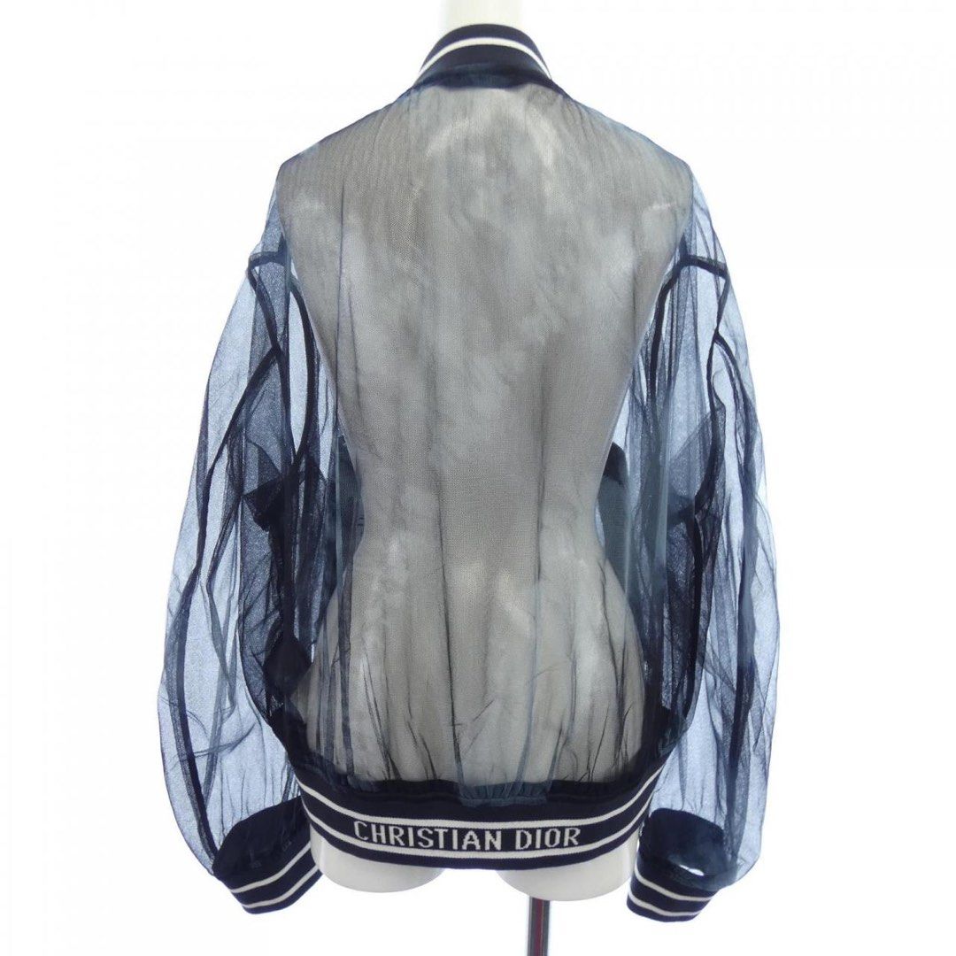 Dior tulle bomber jacket (Category: Activewear) located in Dinalupihan. Submitted by hell.thrift (Listing ID 1438483455, Image 2). Description: Dior tulle bomber jacket 2020 collection Incredible effect, black “Tie and Dior” tulle with blue reflection Length:24 Width:23 Height of model 5’6 No issue Missing care tag.