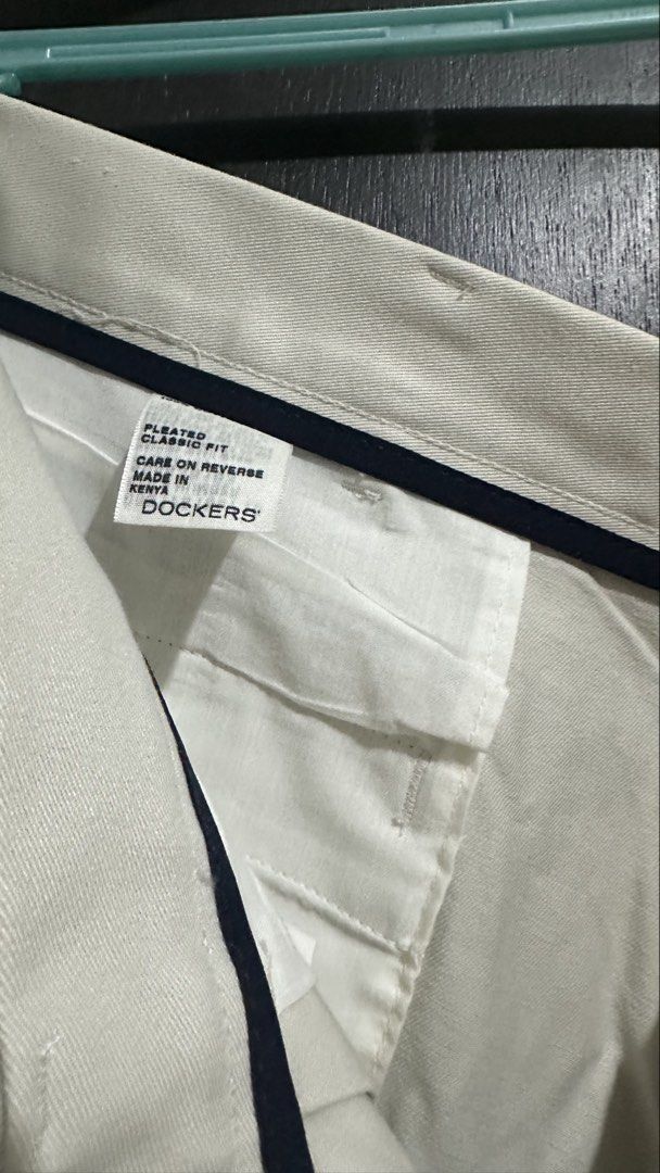 Dockers Classic Fit Pleated Pants (Category: Trousers) located in Paranaque City. Submitted by littlebitofeverythingph (Listing ID 1438441851, Image 3). Description: - Classic fit Dockers pants - W40 L29 - Beige color - Pleated design - Made in Kenya - Two front and two back pockets - Zipper and button closure - Tag reads: "Classic Fit" and "Pleated" .