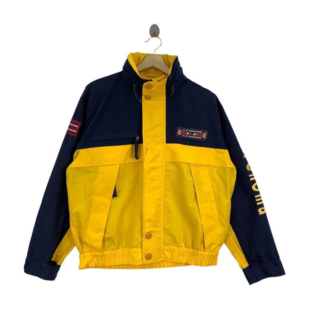 Ed Renoma Color Block Jacket (Category: Coats, Jackets and Outerwear) located in Manila. Submitted by skullvucool (Listing ID 1438340342, Image 1). Description: - UP Renoma color block jacket - Navy blue and yellow design - High collar - Front zipper - Multiple pockets - Brand logo on sleeves and chest - Interior lining with brand logo - Ribbed hem and cuffs.