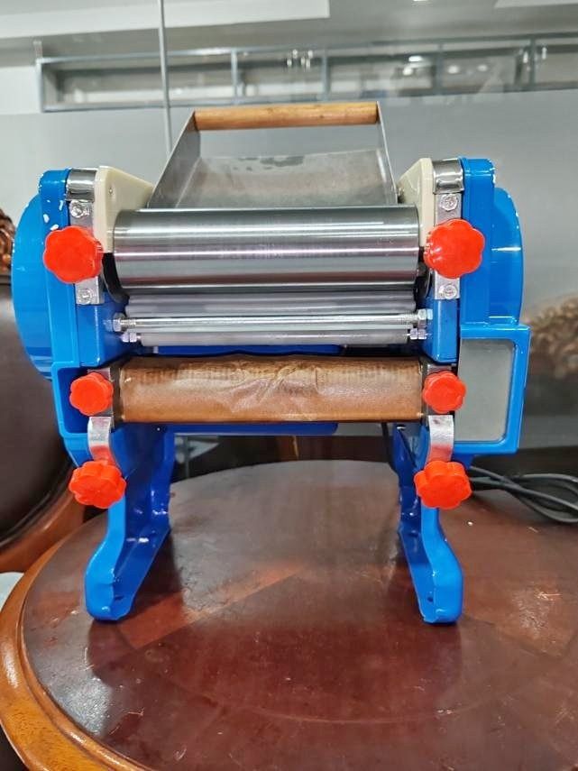 Electric Noodle Maker DZM 200 (Category: Other Kitchen Appliances) located in Taguig. Submitted by minimaliscent (Listing ID 1438319402, Image 2). Description: - Electric noodle maker, model DZM-200 Product Details : Heavy Duty Electric Noodle Cutter Dough Roller DZM-200 PRICE : 5799 Lifetime service/labor warranty, parts NOT included. Dito sa amin gagawin ang unit, hindi kami nag oonsite service. Kahit 10 years na po ang units sa inyo if ever ma