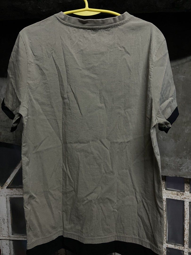 Epoch Liberty Passion T-shirt (Category: Tshirts & Polo Shirts ) located in Taguig. Submitted by misguidedghost (Listing ID 1438469993, Image 3). Description: Brown Printed Shirt with Front Pocket Brand: No Brand Size: XL - Unique design with "Epoch Liberty Passion" on the pocket. - Round neck and short sleeves. - Black accents on sleeves and bottom hem. - Neutral color. - Ideal for casual wear..