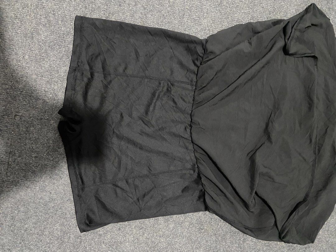 Everlast Black Tennis Skirt (Category: Activewear) located in Tagbilaran City. Submitted by cheesecake44 (Listing ID 1438340013, Image 3). Description: - Everlast black shorts - Elastic waistband - Features inner lining - Size tag visible - Made of lightweight material - Ideal for workouts or casual wear.