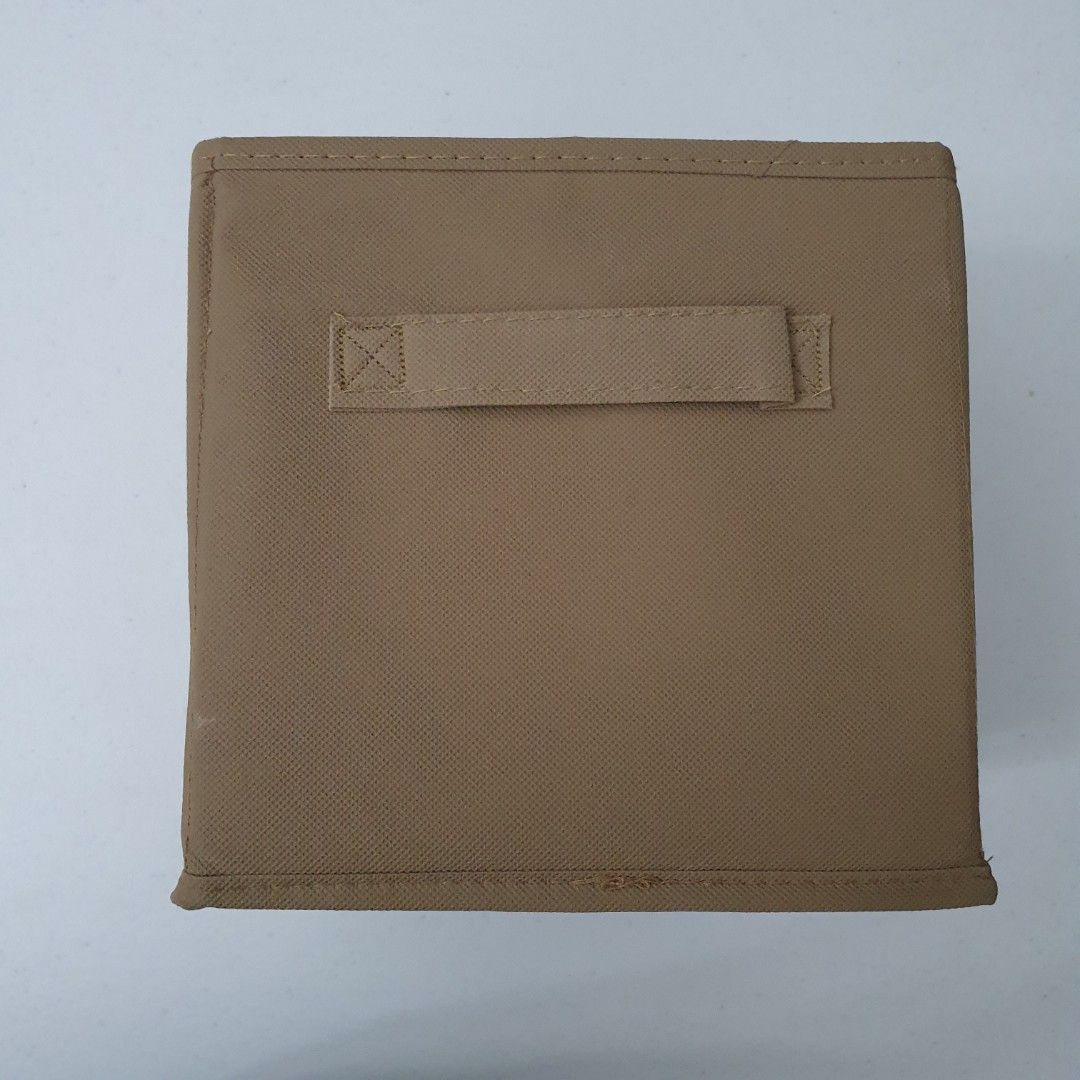 Foldable Storage Box with Handle (Category: Storage Boxes & Baskets) located in Paranaque City. Submitted by cobien (Listing ID 1438498932, Image 3). Description: - Foldable storage box - Durable tan fabric - Convenient handle for carrying - Space-saving design: folds flat - Great for clothes, toys, and more - Sturdy and well-made.