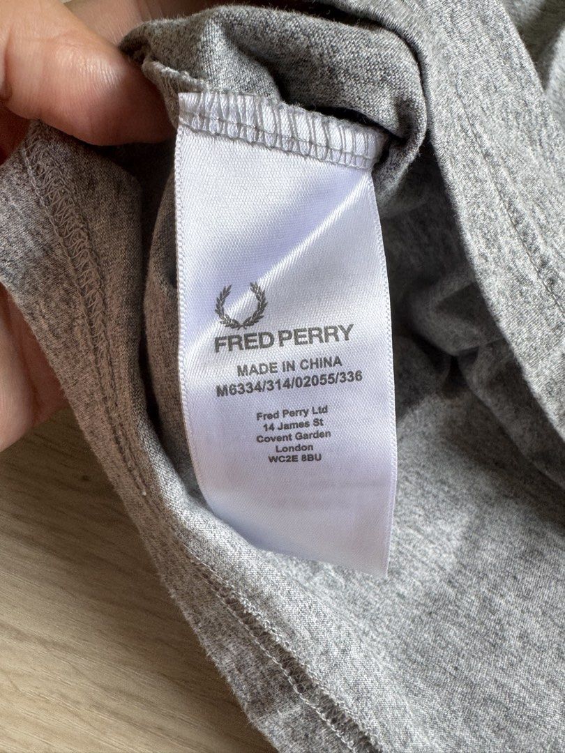 Fred Perry Basic Tee (Category: Tshirts & Polo Shirts) located in Singapore. Submitted by lcenny (Listing ID 1438369706, Image 3). Description: Barely worn Fred Perry round neck tee in marl grey. Mens Size XXL: approx. ptp 60.5cm, length 71cm Condition 9/10 .
