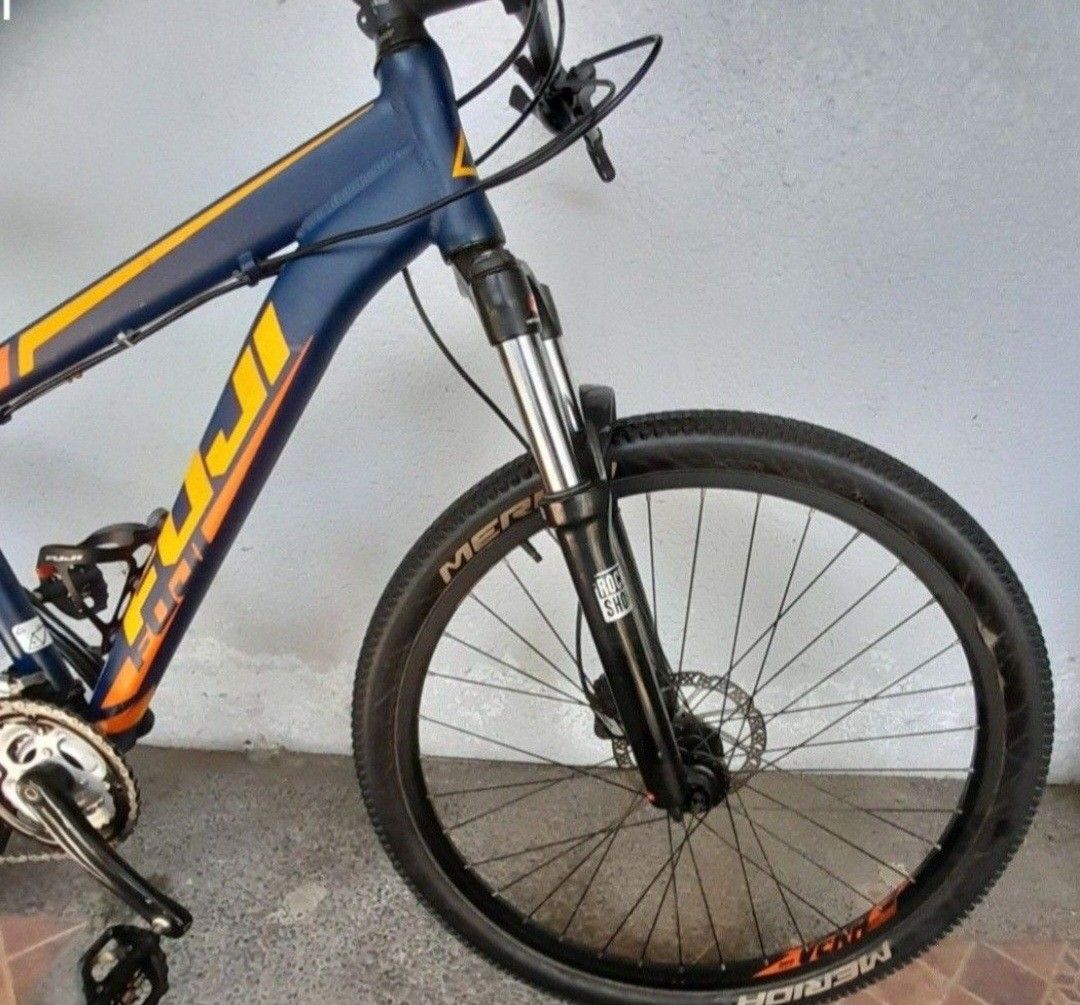 Fuji Nevada Mountain Bike (Category: Bicycles) located in Manila. Submitted by ja_mese (Listing ID 1438360351, Image 2). Description: fs 2016 fuji nevada one.9 -good condition and upgraded -original paint and decals -26er -size small -with bike skin -Rockshox tora sl 318 solo air fork *working lock-out and damper system -carbon fiber flat handle bar on 80mm stem -shimano hydraulic brakes -shimano 3x8 groupset -stock fuji wheelset on 2.1 tires *cl