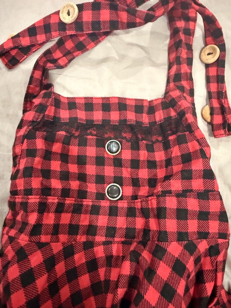 Hailey & Co. Red Plaid Dress (Category: Babies & Kids Fashion) located in Paranaque City. Submitted by mrschuadeclutter (Listing ID 1438440089, Image 3). Description: - Hailey & Co. plaid dress - Red and black color - Halter neck design - Wooden buttons - Ruffled hem - Features two black buttons on bodice - Includes brand tag - Perfect for a casual look Size 2 .