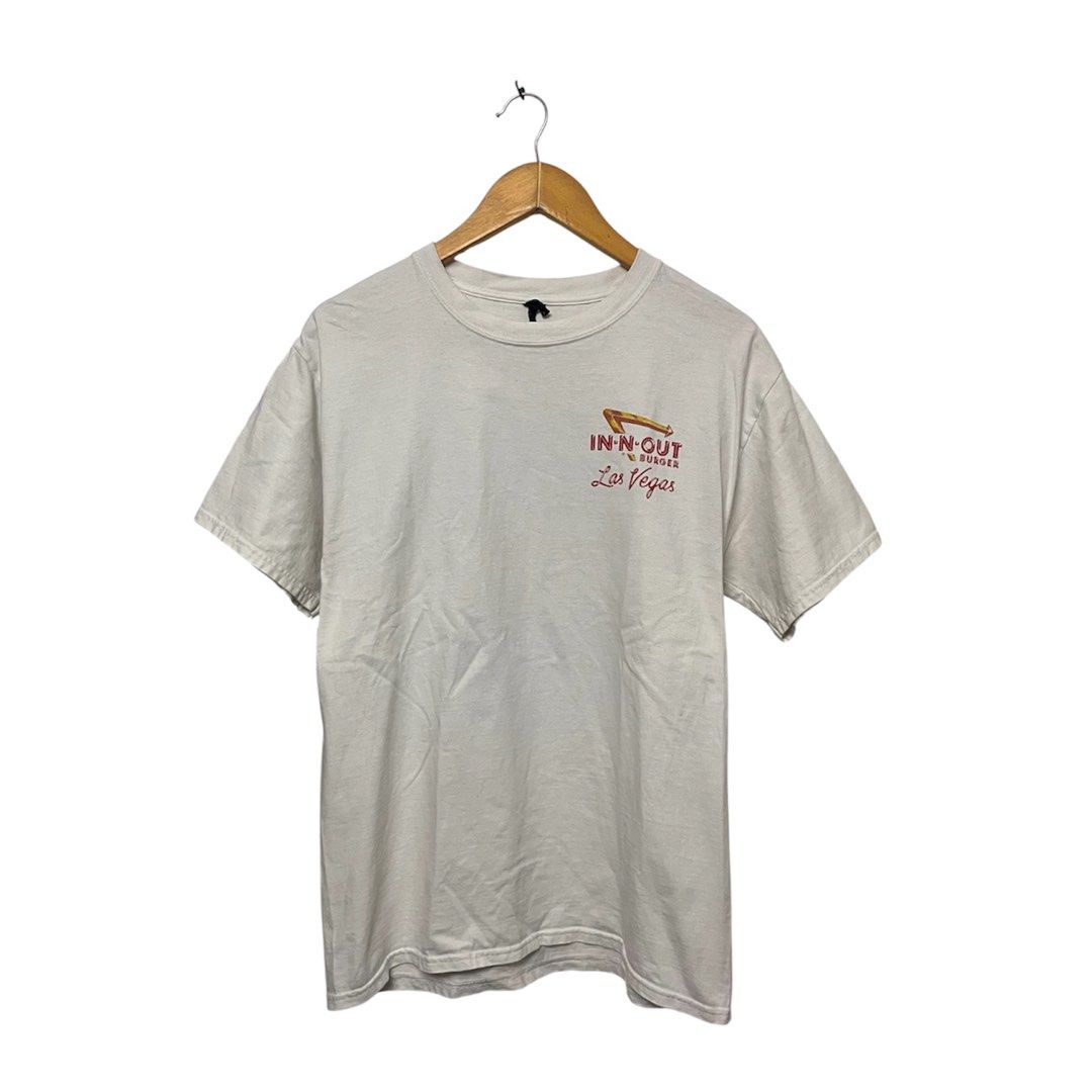 Hanes In-N-Out Burger Graphic Tee (Category: Tshirts & Polo Shirts ) located in Cabuyao City. Submitted by kisyana (Listing ID 1438454728, Image 2). Description: - Vintage In-N-Out Burger t-shirt - Features a graphic on the back with a vintage car and the In-N-Out Burger logo - Smaller In-N-Out Burger logo on the front with "Las Vegas" printed below - "Beefy" style.