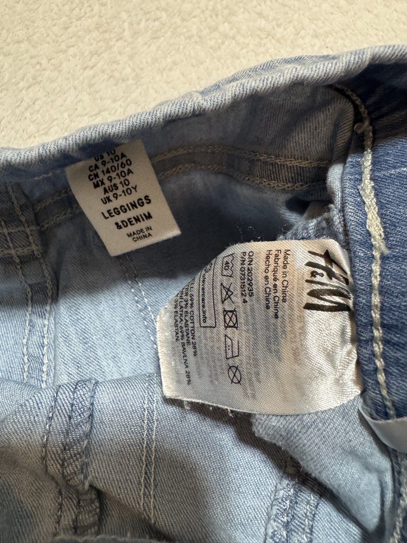 H&M Leggings & Denim, Size 9-10Y (Category: Babies & Kids Fashion) located in Mandaluyong City. Submitted by toront0427 (Listing ID 1438473472, Image 3). Description: - H&M light blue denim leggings - Size: US 10 (fits like US 9-10) - Features: - Elastic waistband - Two back pockets - Made in China - Sizing details: CA 9-10A, CN 140/60, MX 9-10A, UK 9-10Y.
