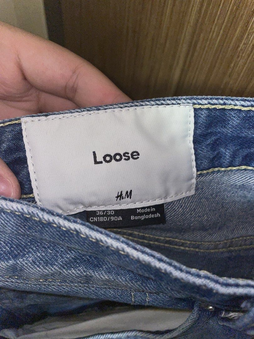 H&M Loose Fit Jeans (Category: Jeans) located in Pasig City. Submitted by randomclothes_ (Listing ID 1438447052, Image 3). Description: - H&M loose fit jeans - Light blue wash - Size: 36/30 - Button closure - Classic five-pocket design - Relaxed fit - Made in Bangladesh Lalamove, Gcash.