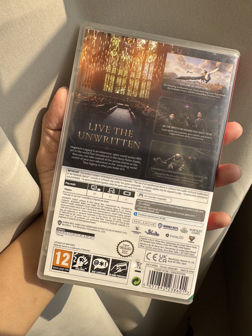 Hogwarts Legacy - Nintendo Switch (Category: Nintendo) located in Quezon City. Submitted by eunicecrooz (Listing ID 1438376843, Image 2). Description: - Bonuses already claimed! - Hogwarts Legacy for Nintendo Switch - Includes game cartridge and original case - Rated 12 - Internet download required - Published by Warner Bros. Games, developed by Avalanche - Explore an open-world Wizarding World adventure.