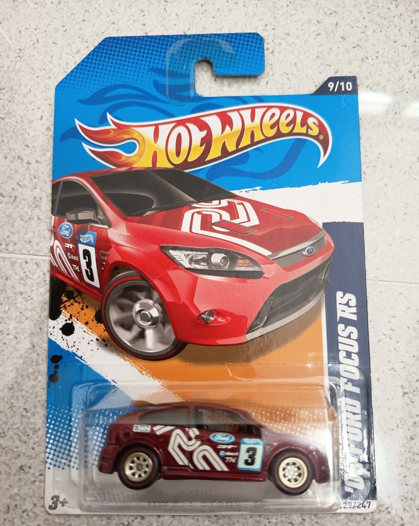 Hot Wheels Ford Focus RS STH Super Treasure (Category: Vehicle & Diecast Models) located in Muntinlupa City. Submitted by toys-22 (Listing ID 1438377743, Image 1). Description: - Hot Wheels Ford Focus RS diecast car - Eye-catching red color with white and blue accents - Features the number 3 on the side and front - Part of the 9/10 series - Comes with original Hot Wheels and Ford branded packaging.