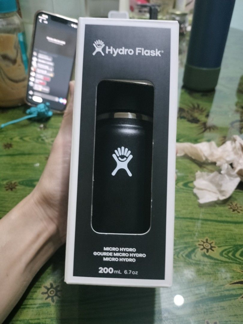 Hydro Flask Micro Hydro 200ml Black Insulated Water Bottle (Category: Water Bottles & Tumblers) located in Cavite. Submitted by indigence (Listing ID 1438318344, Image 1). Description: - Hydro Flask Micro Hydro 200ml black water bottle - Keeps drinks cold for 7 hours - Keeps drinks hot for 7 hours - Leakproof design - Made of durable stainless steel - Dishwasher safe - Includes care and use instructions.