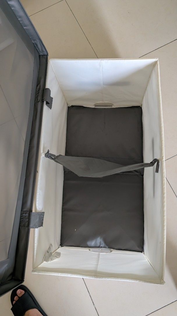 IKEA JATTEBJORN Storage Box (Category: Storage Boxes & Baskets) located in Manila. Submitted by decluttering_9917354 (Listing ID 1438362837, Image 3). Description: IKEA JATTEBJORN storage box. It has a gray exterior and a white interior. The box has a mesh divider inside. The dimensions are approximately 81cm x 44cm x 45cm.