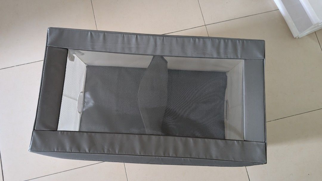 IKEA JATTEBJORN Storage Box (Category: Storage Boxes & Baskets) located in Manila. Submitted by decluttering_9917354 (Listing ID 1438362837, Image 2). Description: IKEA JATTEBJORN storage box. It has a gray exterior and a white interior. The box has a mesh divider inside. The dimensions are approximately 81cm x 44cm x 45cm.