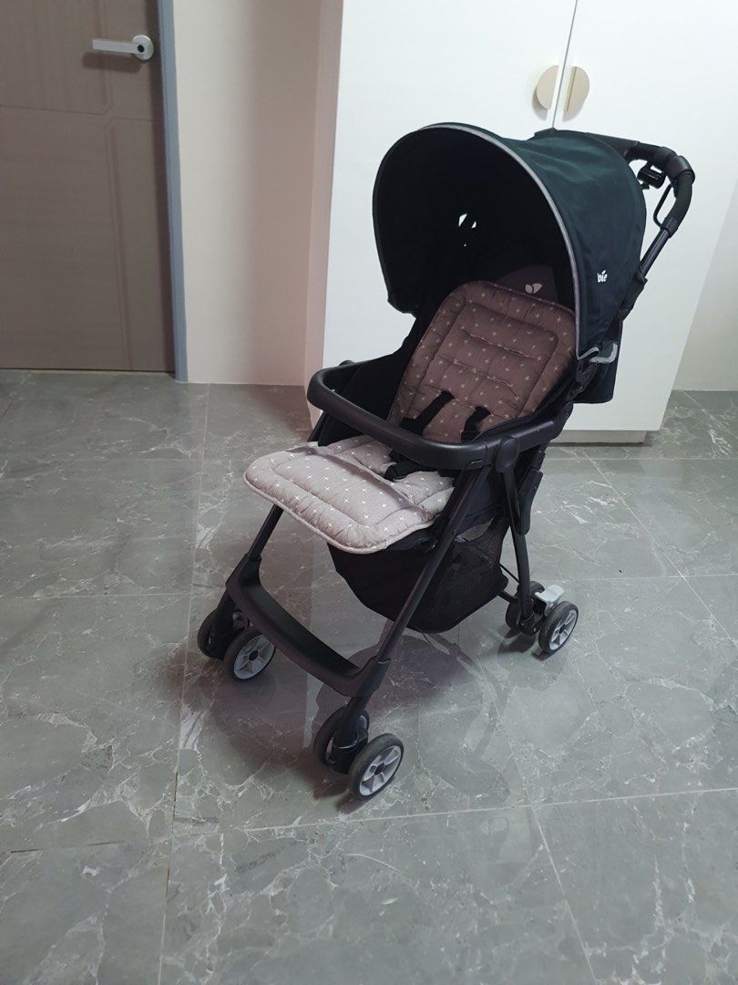 Joie Juva Stroller (Category: Strollers) located in Calamba. Submitted by tin1904 (Listing ID 1438338707, Image 1). Description: - Joie stroller with a sleek black frame and canopy. - Convenient storage basket underneath. - Easily foldable for compact storage and transport. - Designed with multiple wheels for enhanced stability and maneuverability. - RFS: No longer being used. .