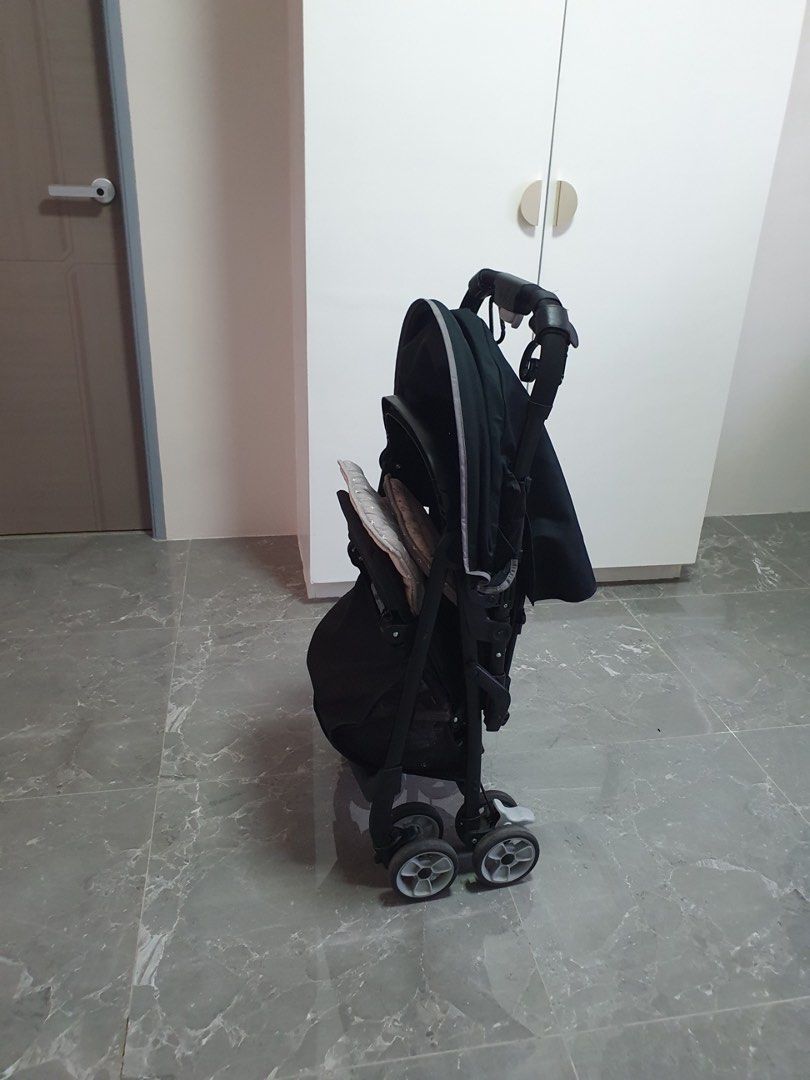 Joie Juva Stroller (Category: Strollers) located in Calamba. Submitted by tin1904 (Listing ID 1438338707, Image 2). Description: - Joie stroller with a sleek black frame and canopy. - Convenient storage basket underneath. - Easily foldable for compact storage and transport. - Designed with multiple wheels for enhanced stability and maneuverability. - RFS: No longer being used. .