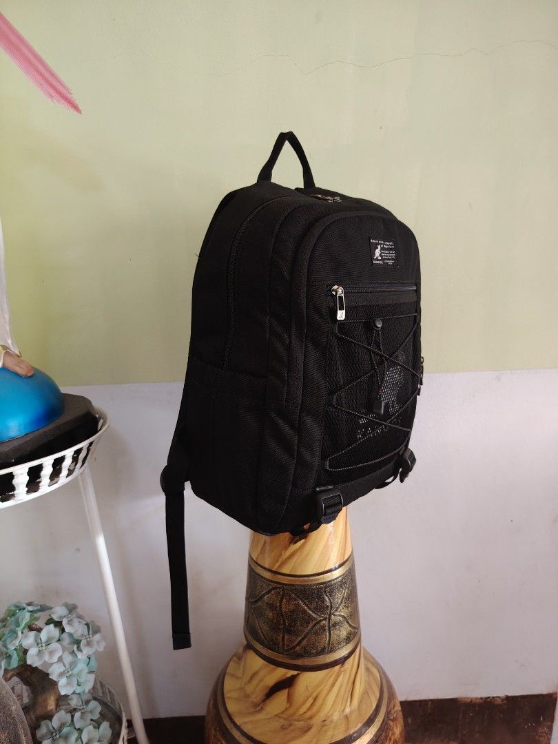 Kangol Black Backpack in like new condition (Category: Backpacks) located in Bulacan. Submitted by branded_murayta (Listing ID 1438307796, Image 3). Description: AVAℹ️LABLE • Authentic Kangol Backpack in Black • semi Large in size ( 17x 12 x 5inches) ❤️perfect for office,school, work & everyday use 👉 Has spacious compartment • Has padded laptop pocket • Fits 16-inch laptop 👍 with insulated side tumbler pocket👍 like condition • Durable • Php 13