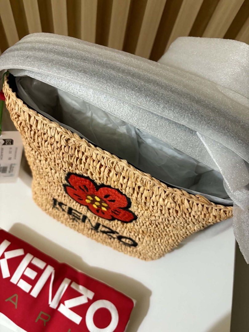 Kenzo Raffia Bucket Bag (Category: Luxury Bags & Wallets) located in Quezon City. Submitted by cel1111 (Listing ID 1438433791, Image 3). Description: Kenzo Raffia Bucket Bag Brand new/unused With tags & dust bag original price around 27k.