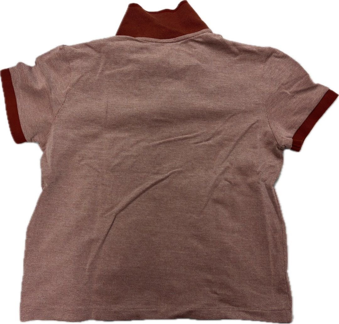 Lacoste Regular Fit Polo Shirt (Category: Shirts) located in Paranaque City. Submitted by joetrd (Listing ID 1438480743, Image 2). Description: - Color: Reddish-brown - Unique ribbed collar - Cropped Regular Fit - No issues/defects at all - Length Measurement: 21 inches - Width Measurement: 19.5 inches.