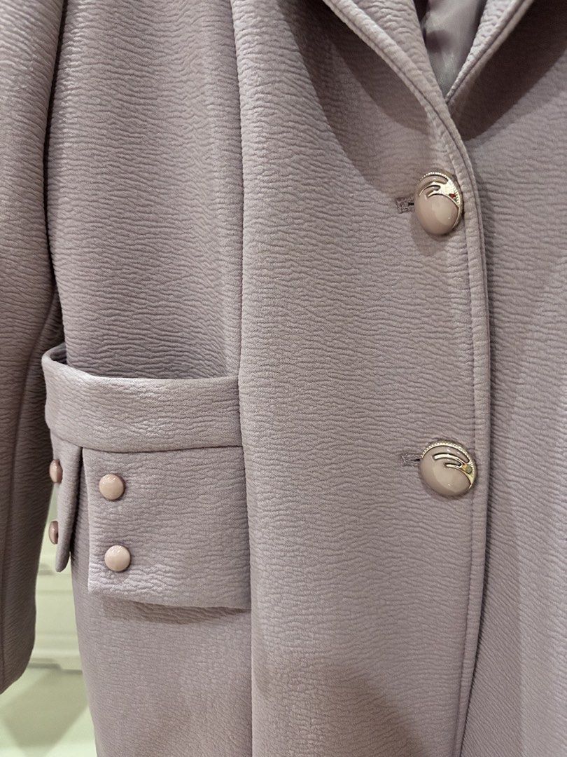 Lavender Blazer with Button Details (Category: Coats, Jackets and Outerwear) located in Los Banos. Submitted by _loopee27 (Listing ID 1438352668, Image 2). Description: - Lavender blazer - Textured fabric - Classic lapel design - Two front pockets with button details - Two-button closure - Satin lining (minor damage).