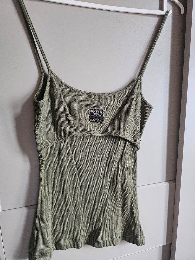Loewe Olive Green Tank Top (Category: Luxury Apparel) located in Caloocan City. Submitted by mymyg (Listing ID 1435540701, Image 2). Description: - Authentic Loewe olive green ribbed tank top - bought from le bon marche (shares a receipt with the other loewe top posted) - Features the Loewe logo - Made from a lightweight, textured fabric - RFS i am now 2 size larger!.