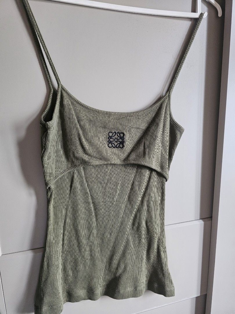 Loewe Olive Green Tank Top (Category: Luxury Apparel) located in Caloocan City. Submitted by mymyg (Listing ID 1435540701, Image 1). Description: - Authentic Loewe olive green ribbed tank top - bought from le bon marche (shares a receipt with the other loewe top posted) - Features the Loewe logo - Made from a lightweight, textured fabric - RFS i am now 2 size larger!.
