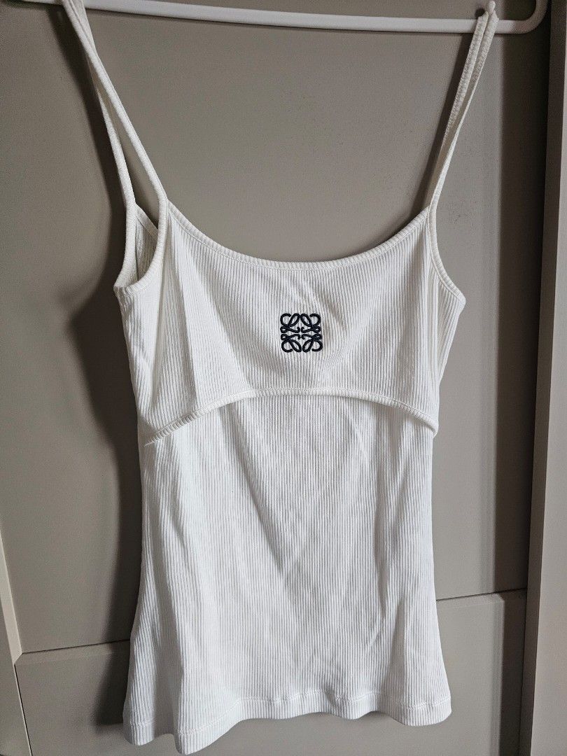 Loewe Ribbed Tank Top (Category: Luxury Apparel) located in Caloocan City. Submitted by mymyg (Listing ID 1435540413, Image 2). Description: - Authentic Loewe white ribbed tank top - bought from le bon marche (shares a receipt with the other loewe top posted) - Features the Loewe logo - Made from a lightweight, textured fabric - RFS i am now 2 size larger!.