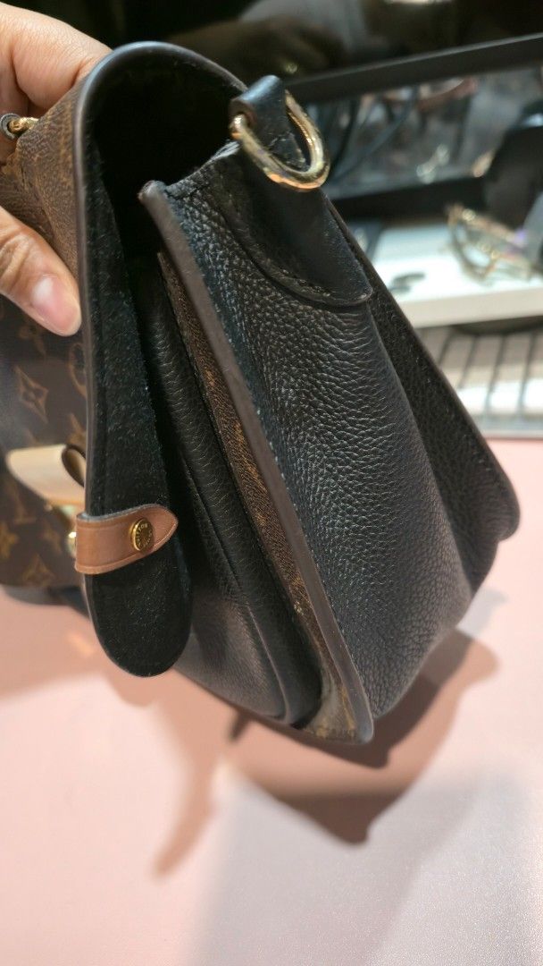 Louis Vuitton Monogram Handbag (Category: Luxury Bags & Wallets) located in Caloocan City. Submitted by sandy119 (Listing ID 1438326659, Image 3). Description: - Authentic Louis Vuitton handbag - Iconic monogram pattern - Top handle design - Secure lock closure - Gold-tone hardware - Black interior - Structured shape - Black leather base.