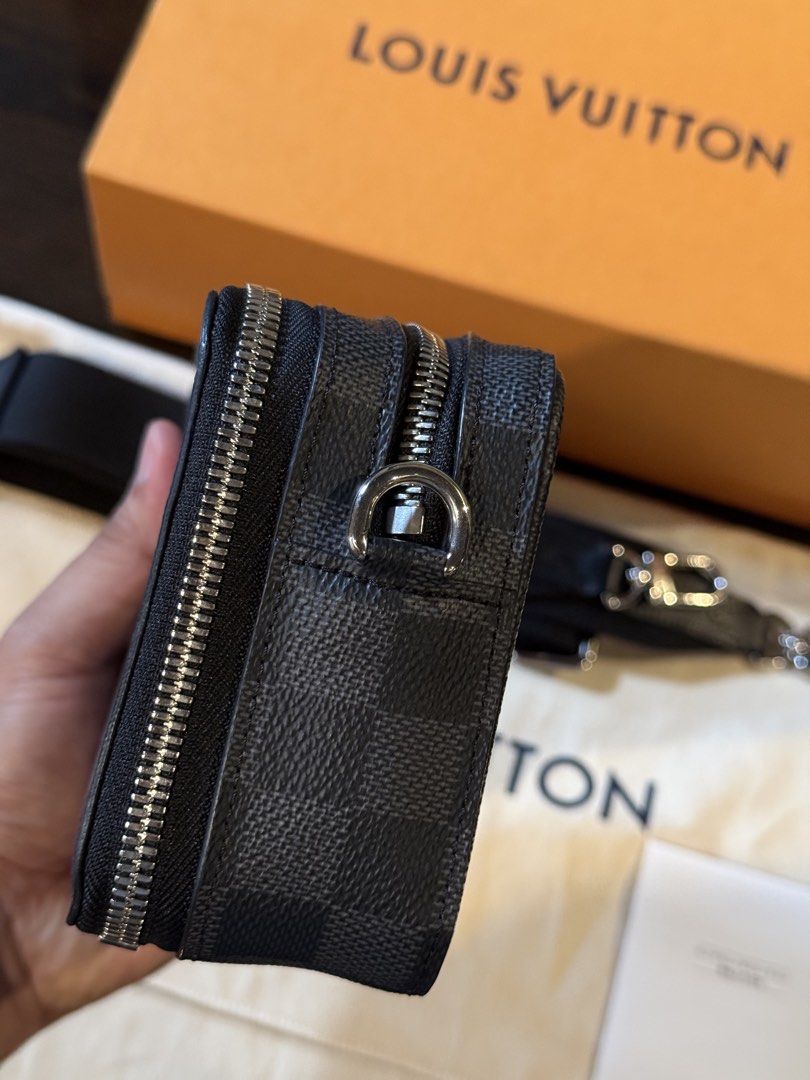 Louis Vuitton Damier Graphite Alpha (Category: Luxury Bags & Wallets) located in Manila. Submitted by marlonjaya48704 (Listing ID 1438362424, Image 3). Description: - Authentic Louis Vuitton Pocket Organizer Crossbody Bag - Damier Graphite canvas - Zip closure - Adjustable strap - Silver-tone hardware - Includes original box, dust bag, and paperwork - Iconic Damier Graphite pattern - Perfect for carrying essentials.
