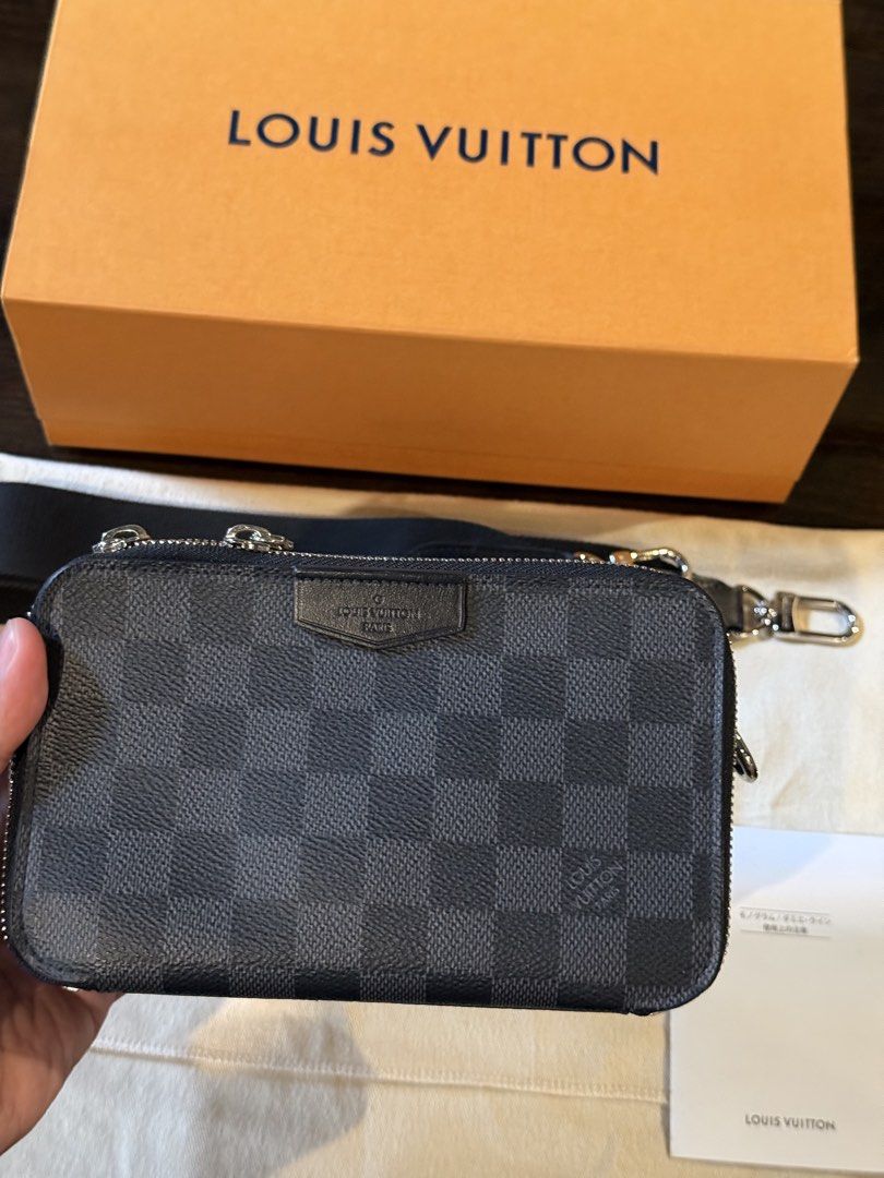 Louis Vuitton Damier Graphite Alpha (Category: Luxury Bags & Wallets) located in Manila. Submitted by marlonjaya48704 (Listing ID 1438362424, Image 2). Description: - Authentic Louis Vuitton Pocket Organizer Crossbody Bag - Damier Graphite canvas - Zip closure - Adjustable strap - Silver-tone hardware - Includes original box, dust bag, and paperwork - Iconic Damier Graphite pattern - Perfect for carrying essentials.