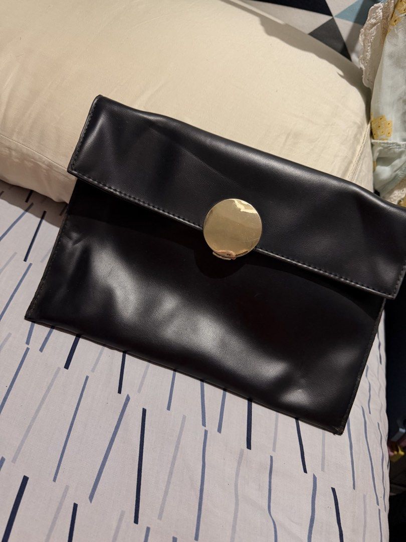 Louis Vuitton Wallet and Black Clutch (Category: Luxury Bags & Wallets) located in Taguig. Submitted by marshmy (Listing ID 1438352997, Image 3). Description: - Authentic Louis Vuitton wallet with monogram pattern - Snap closure - Multiple compartments - Black clutch with gold-tone clasp and chain strap - Red interior.