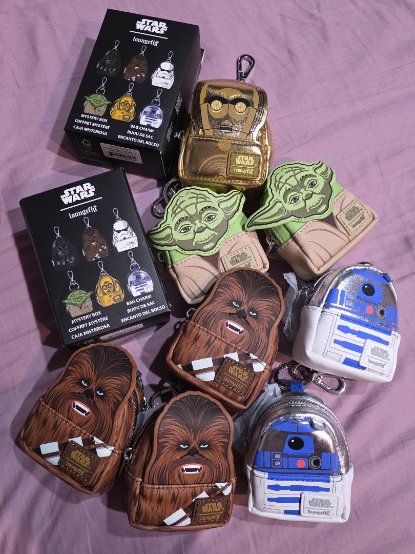 Loungefly Star Wars Mystery Bag Charm (Category: Character Goods) located in Taguig. Submitted by lovedbymicah (Listing ID 1438464746, Image 1). Description: Dupes Have: 2 Chewbacca 1 Yoda 1 R2-D2 - SOLD Willing to trade for Vader or Storm Trooper 📍BGC.