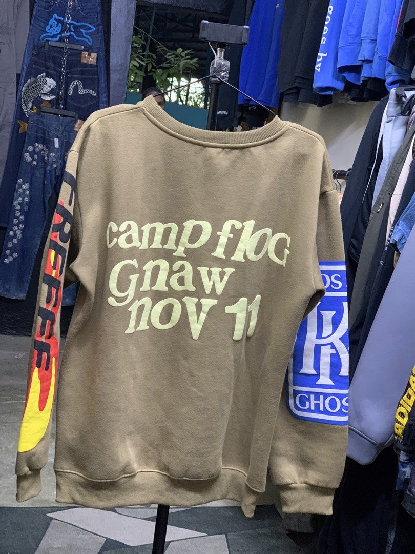 Lucky Me I See Ghosts Sweatshirt (Category: Longsleeves) located in Manila. Submitted by tito_balbas.12 (Listing ID 1438452254, Image 3). Description: - Unisex sweatshirt - Color: Tan/Light Brown - Design: "Lucky me! I see Ghosts" on front, "camp flog gnaw nov 11" on back - Features: Crew neck, long sleeves with graphics.